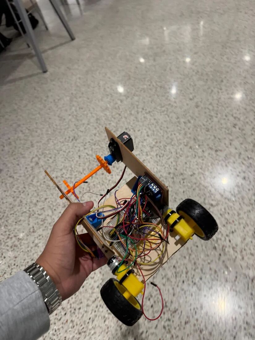 Roller intake mechanism, angled view, held in hand