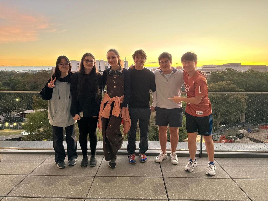 Team photo at sunrise, competition morning